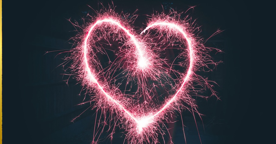 Pink heart created from sparklers